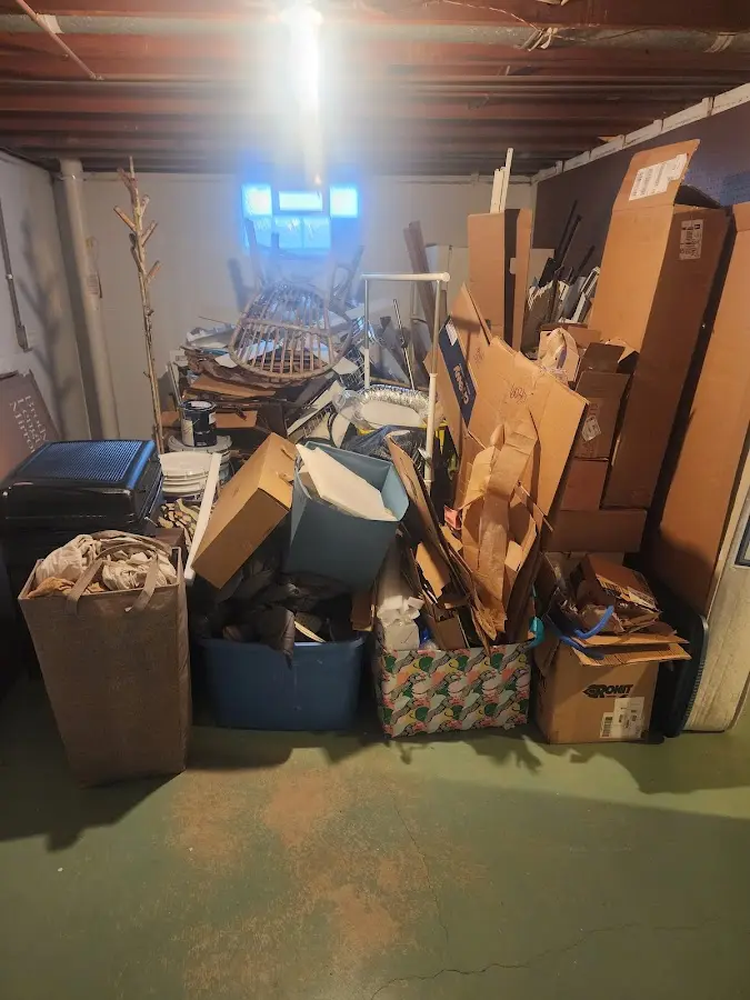 Roll-off dumpster container at job site for 15 Yard Dumpster Rental in Minnehaha